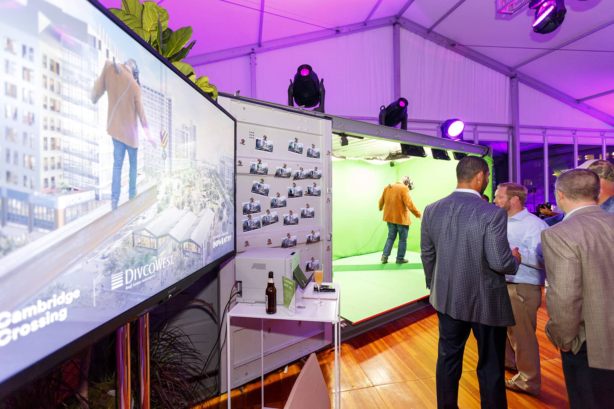 Attendees observe immersive virtual reality demonstration showcasing Cambridge Crossing vision